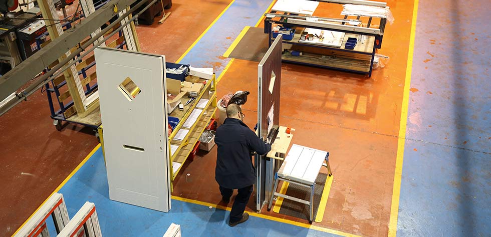 A worker testing one of our composite doors to ensure it meets standards