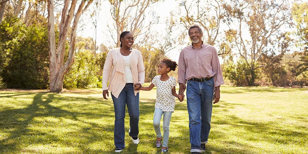 Family walk in a park