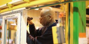One of our engineers working on a newly manufactured window frame