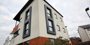 New build property with casement windows in grey PVCu