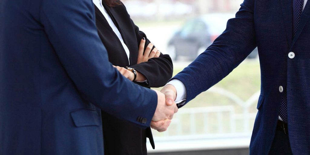 Two people shaking hands