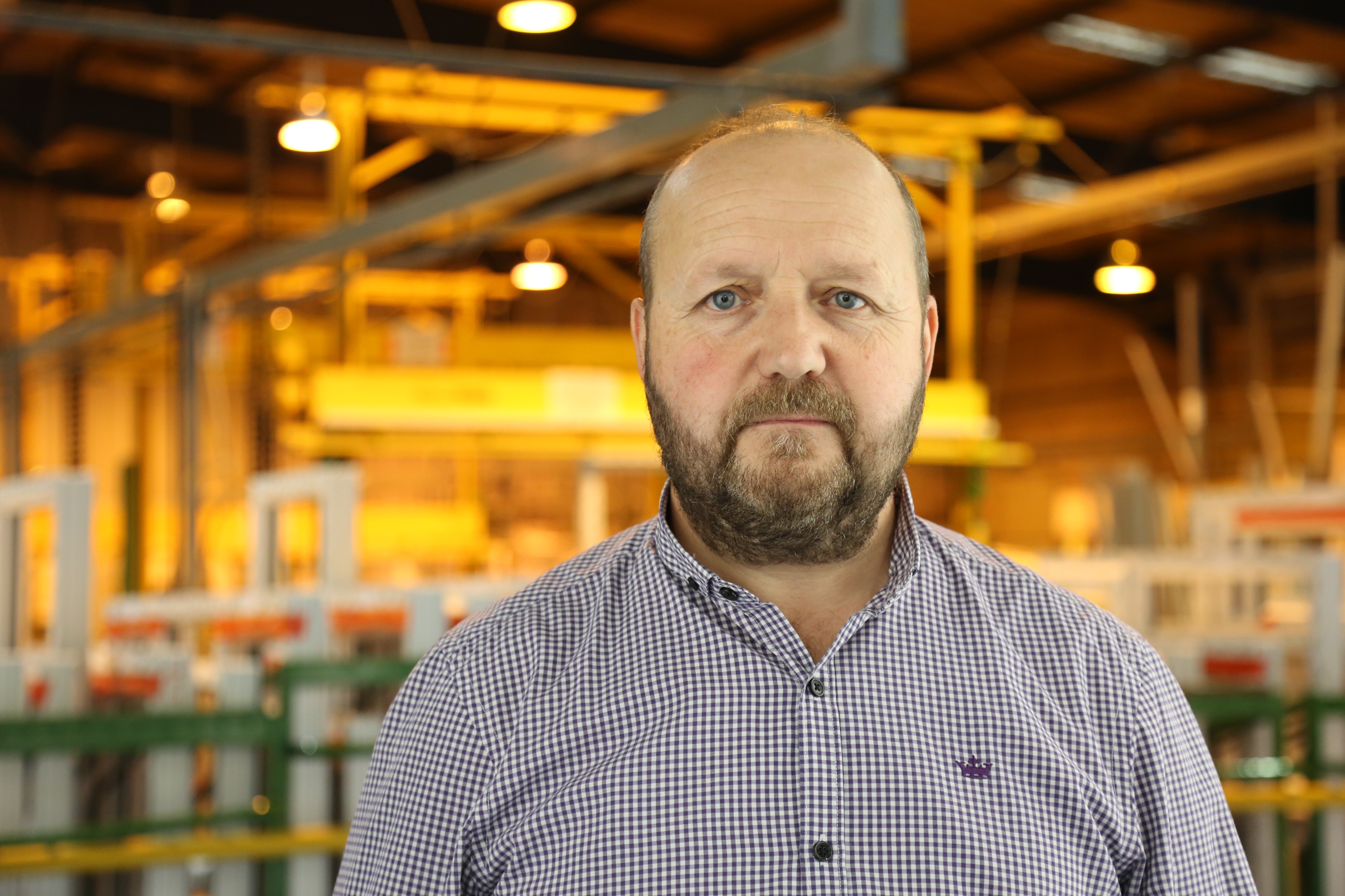 Howard standing in the shelforce warehouse